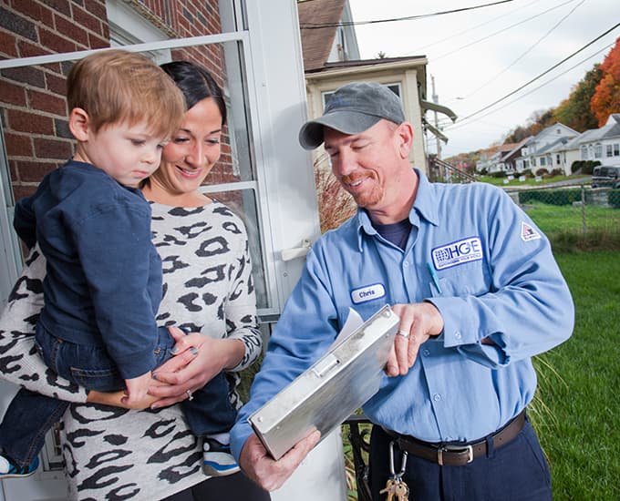 Service Tech Greeting Customer with Child